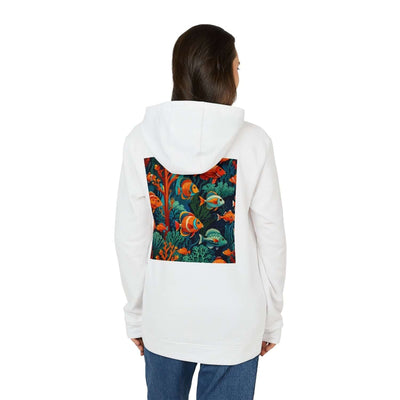 woman wearing a sustainable  white fleece hoodie customized by Vexora Apparel with corals and tropical fish